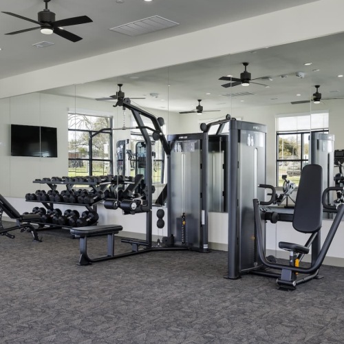 fitness center room showing ample equipment