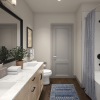 a well-lit bathroom with ample space